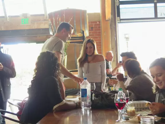Hip area with wine bars, cafes, and bakeries, where you can sit on a patio surrounded by ivy-covered walls.