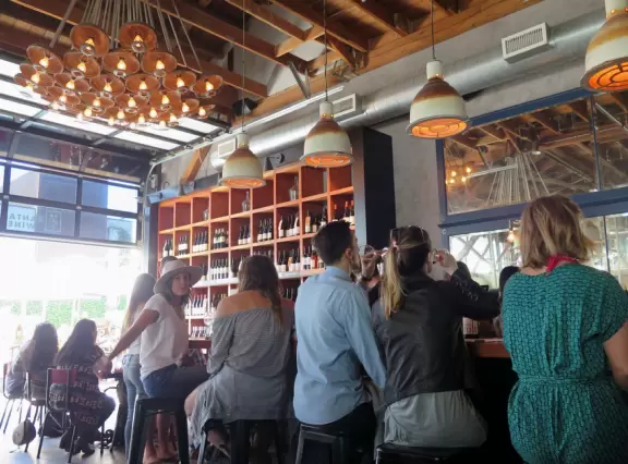 Hip area with wine bars, cafes, and bakeries, where you can sit on a patio surrounded by ivy-covered walls.