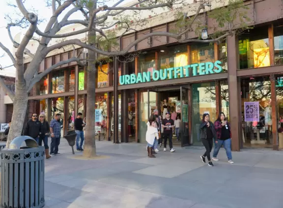 A pretty, pedestrian-only street, with performers, tons of people, and lots of shopping.