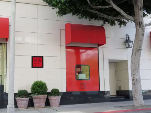 Walk past the mansion of Beverly Hills.