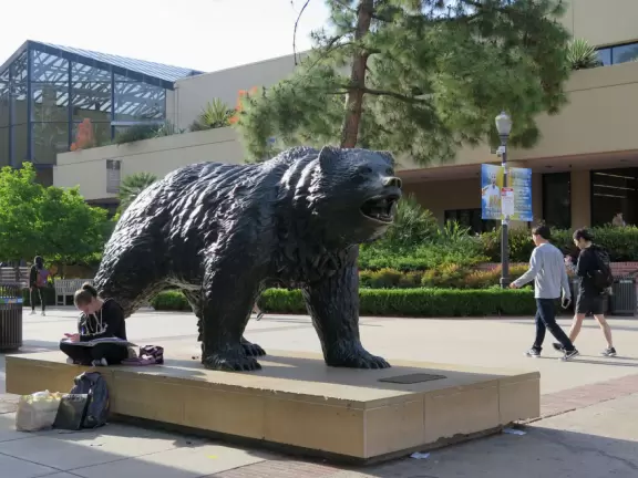 Gorgeous campus with Romanesque Revival architecture, huge sloping lawns, and old trees.
