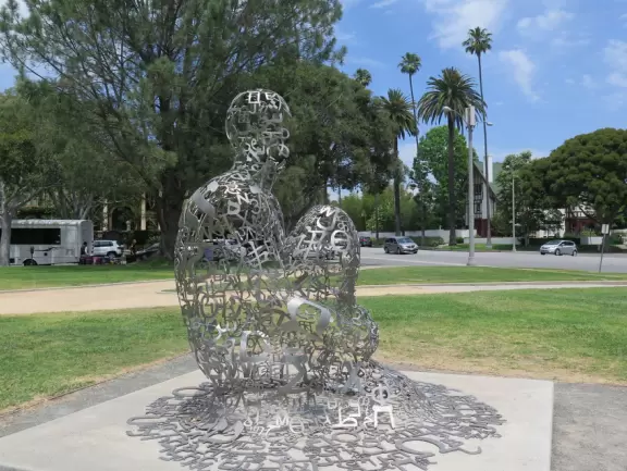 Walk past the mansion of Beverly Hills.