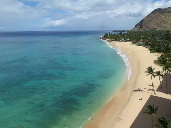 Beautiful, uncrowded beach with steep dropoff and large waves.