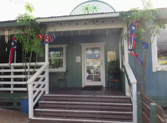 Calm swimming area with rock wall that blocks waves.