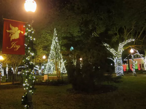 A tiny main street with lovely Christmas lights, plus a large area of cookie cutter homes with some shadeless walking paths and lots of small parks.