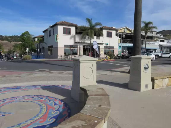 Colorful, pretty main street and boardwalk, with great cafes, lovely ship playground, and mesmerizing yellow cliffs.