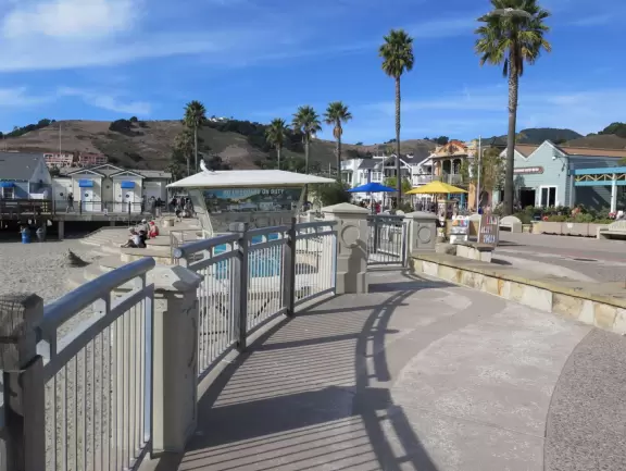 Colorful, pretty main street and boardwalk, with great cafes, lovely ship playground, and mesmerizing yellow cliffs.