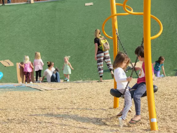 Best playground you'll ever visit! Huge slides, hillside slides, steep grass slope for cardboard sledding, cable zipline, and pretty trees to picnic under.
