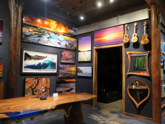 Old plantation town with surf shops, art galleries, and restaurants.