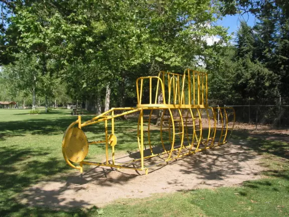 Huge park with large shady lawns, trippy playground equipment, and gorgeous mountain views.