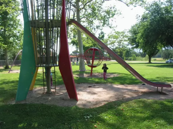 Huge park with large shady lawns, trippy playground equipment, and gorgeous mountain views.