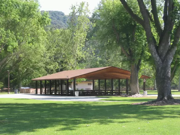 Huge park with large shady lawns, trippy playground equipment, and gorgeous mountain views.