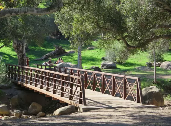 A small park tucked into a canyon in the back of a beautiful neighborhood.