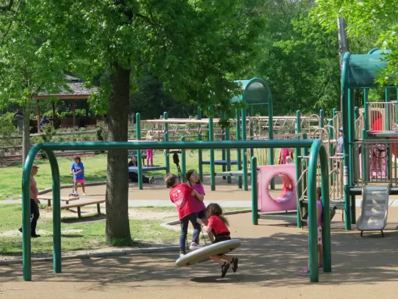 Large shady playground with fun three-person spinner swing. Bolin Creek&nbsp;bike path starts here.