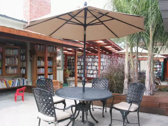 Downtown historic Ojai has a row of endless arches, independent bookstores, an icecream parlor, a Farmer's market and concerts in the park.