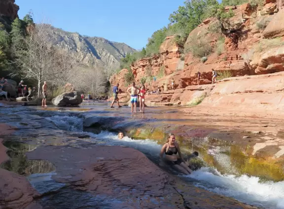 A paradise where you can slide down natural rock slides, in exquisite Oak Creek Canyon.