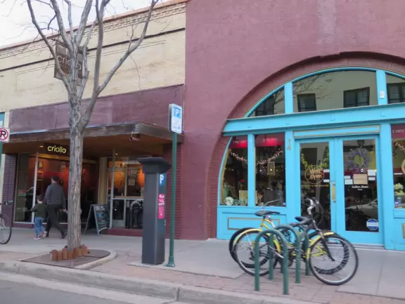 Youthful restaurants in the south part of downtown Flagstaff and historic storefronts in the north part.