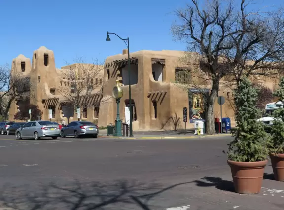 Town with plain geographical features but nice adobe structures, basilica, and museums.