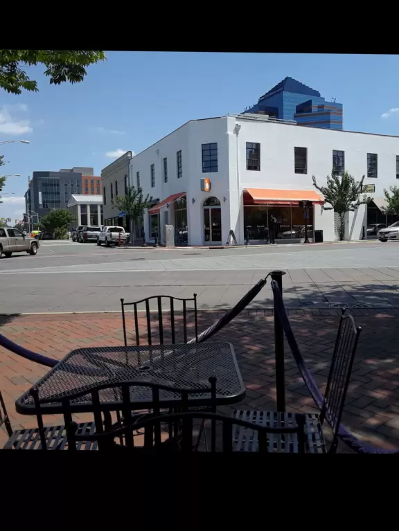 Humble town with&nbsp;youthful coffee shops and restaurants.