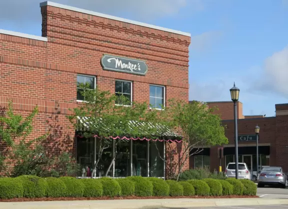 Lovely development with brick buildings, outdoor cafes in the sun, and a fountain, plus a great bike path nearby.