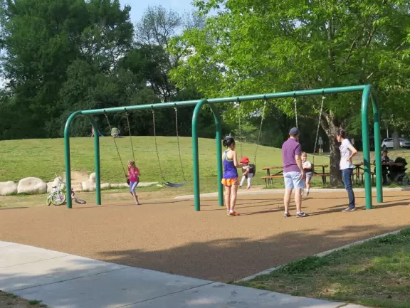 Large shady playground with fun three-person spinner swing. Bolin Creek&nbsp;bike path starts here.