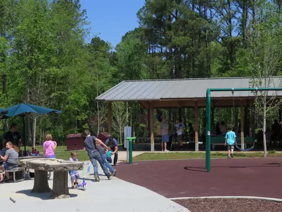 Large&nbsp;playground with dinosaur bouncy, stepping stones,&nbsp;zipline and more!