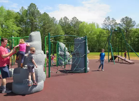 Large&nbsp;playground with dinosaur bouncy, stepping stones,&nbsp;zipline and more!