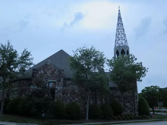 Cute area with outdoor cafes, flower boxes, church steeple with chimes, and village green&nbsp;where family events such as movie night or games night are held.