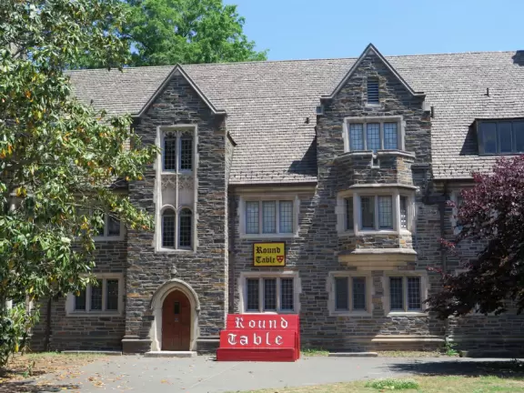 Gorgeous Gothic architecture, impressive chapel, and cute patios under leafy trees.