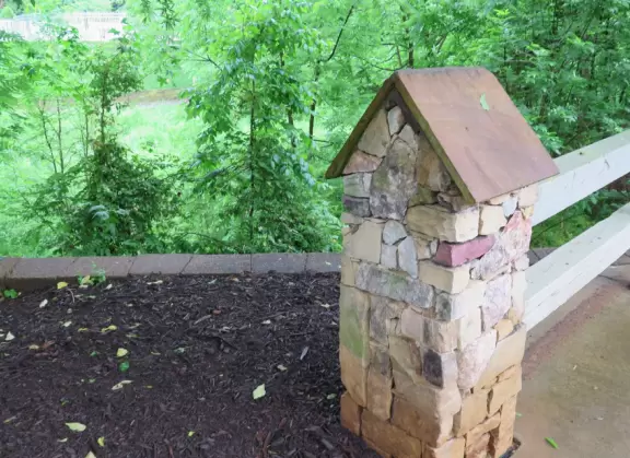 Peaceful greenway with flowers and almost tropical vegetation, that takes you to a lake!