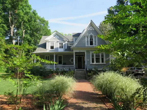 Walk past the beautiful sorority and fraternity houses in the shade of trees.