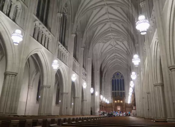 Gorgeous Gothic architecture, impressive chapel, and cute patios under leafy trees.