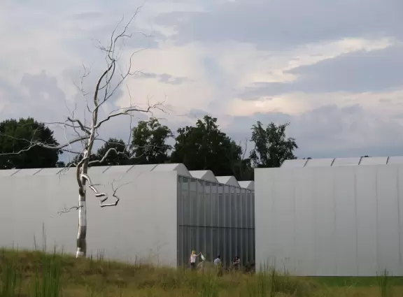 Airy modern architecture and many paintings. Cafe, gift shop, amazing landscaped grounds with sculptures and boulders to climb. Summer concerts.