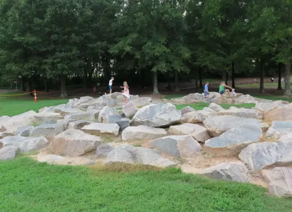 Airy modern architecture and many paintings. Cafe, gift shop, amazing landscaped grounds with sculptures and boulders to climb. Summer concerts.