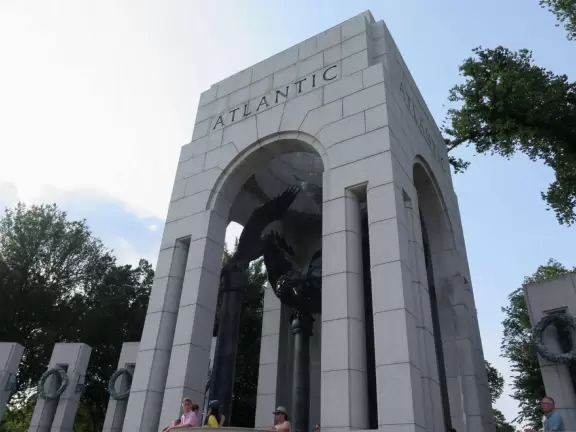 Large memorial with fountain and pillars.