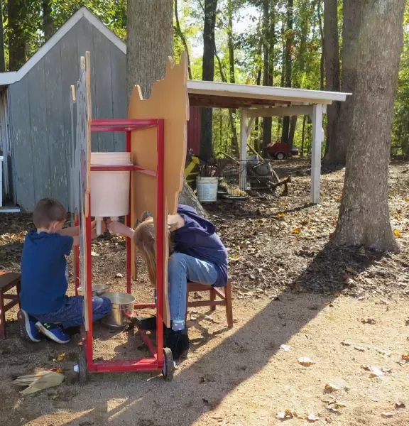 12 acre corn maze, tree swing, hay ride, barrel train ride, cozy coupes, sand pit with tractors, pretend cow milking, goats, donkey, chickens, scarecrows, and pumpkins.