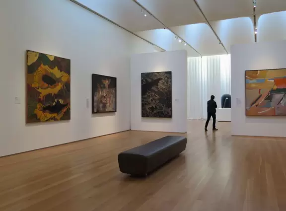 Airy modern architecture and many paintings. Cafe, gift shop, amazing landscaped grounds with sculptures and boulders to climb. Summer concerts.