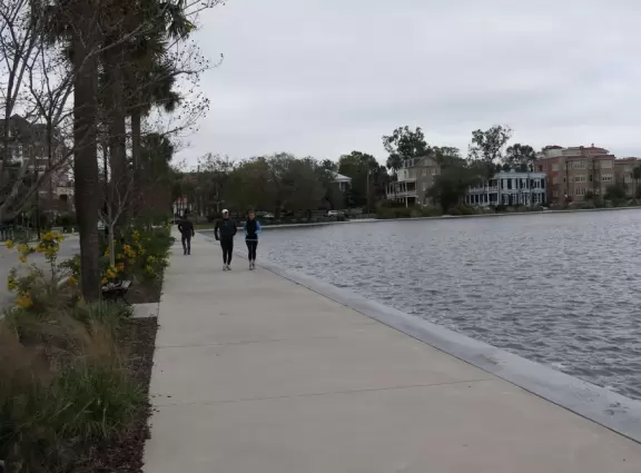 Small cute lake with walking/running promenade around it.