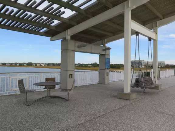 Drive over the gorgeous bridge. Then picnic on the huge lawn and playground, and walk the pier.