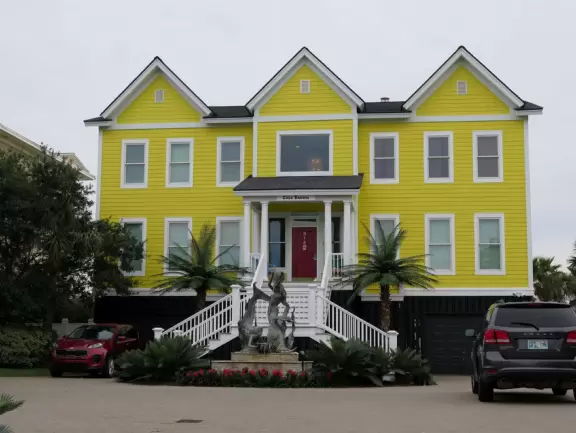 Lovely area with attractive homes, tropical landscaping, decent beach, and nice main strip.