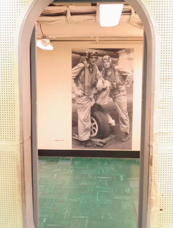 Beautiful bright harbor views from this huge aircraft carrier!