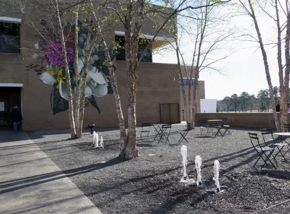 Airy modern architecture and many paintings. Cafe, gift shop, amazing landscaped grounds with sculptures and boulders to climb. Summer concerts.