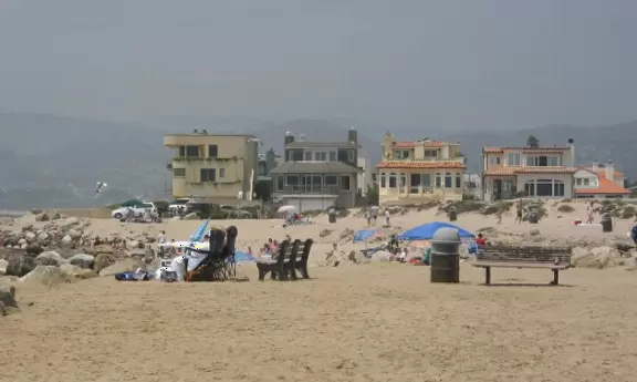 Lovely cove, grassy hills, Spanish galleon ship, playground, walkway out to the point, rocky jetties, and modern beachhouses!