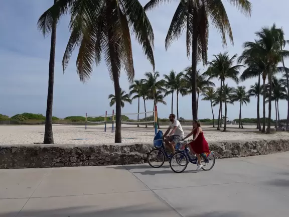It's fun and easy to ride along the boardwalk in South Beach that is nestled between Ocean Drive and the sand. You can bike for 7.7 miles from South Pointe Pier to 87th Street.