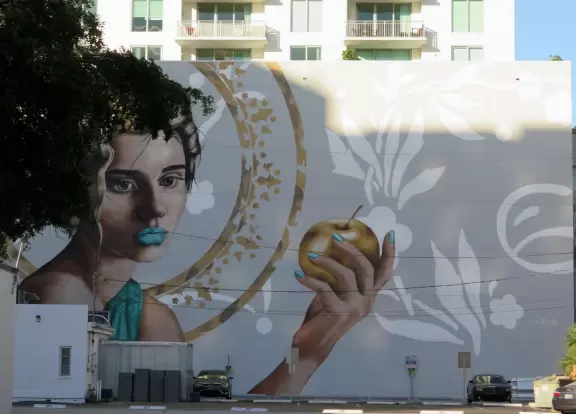 Main strip of West Palm Beach, with colorful and inviting architecture and decorations.