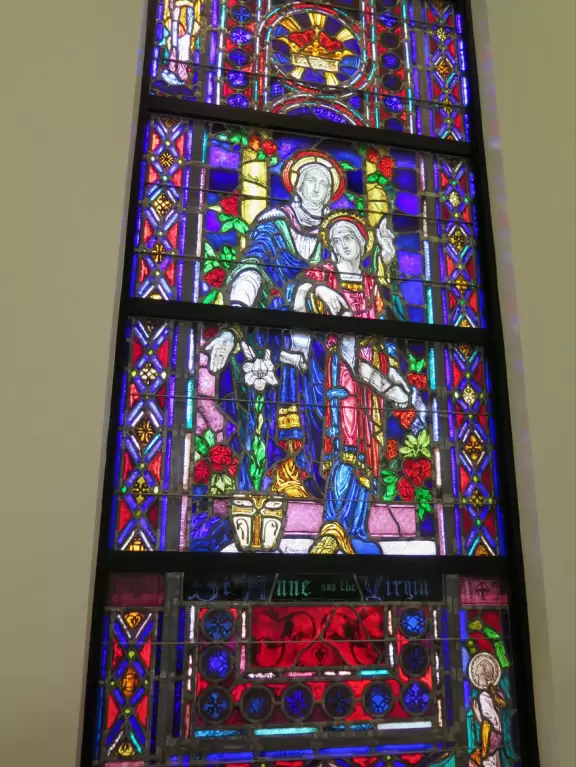 Beautiful, modern cathedral with colorful statues, the twelve stations of the cross, bright stained glass, light-filled rotunda, and amazing organ.