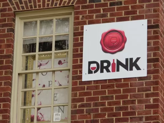 Downtown street with many blocks of bars, near NC State University.