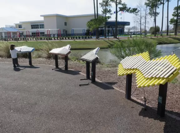Amazing playground in a lovely park with a small lake.