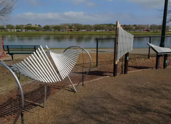 Amazing playground in a lovely park with a small lake.