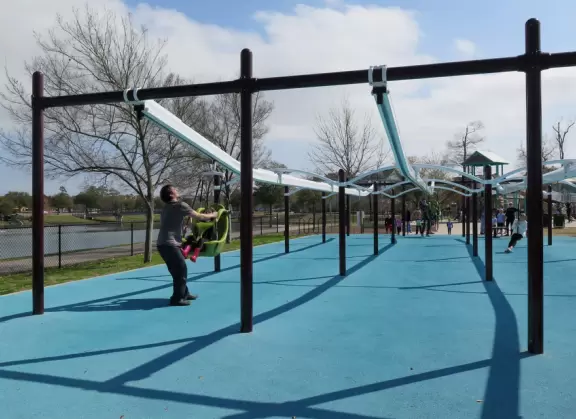 Amazing playground in a lovely park with a small lake.